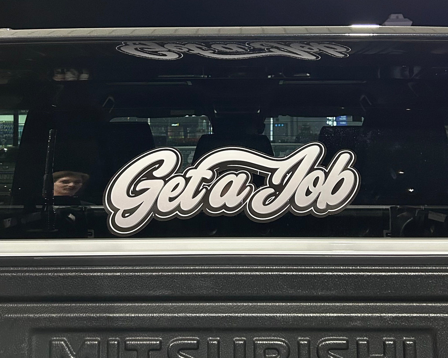 Rear window and lower windscreen banner